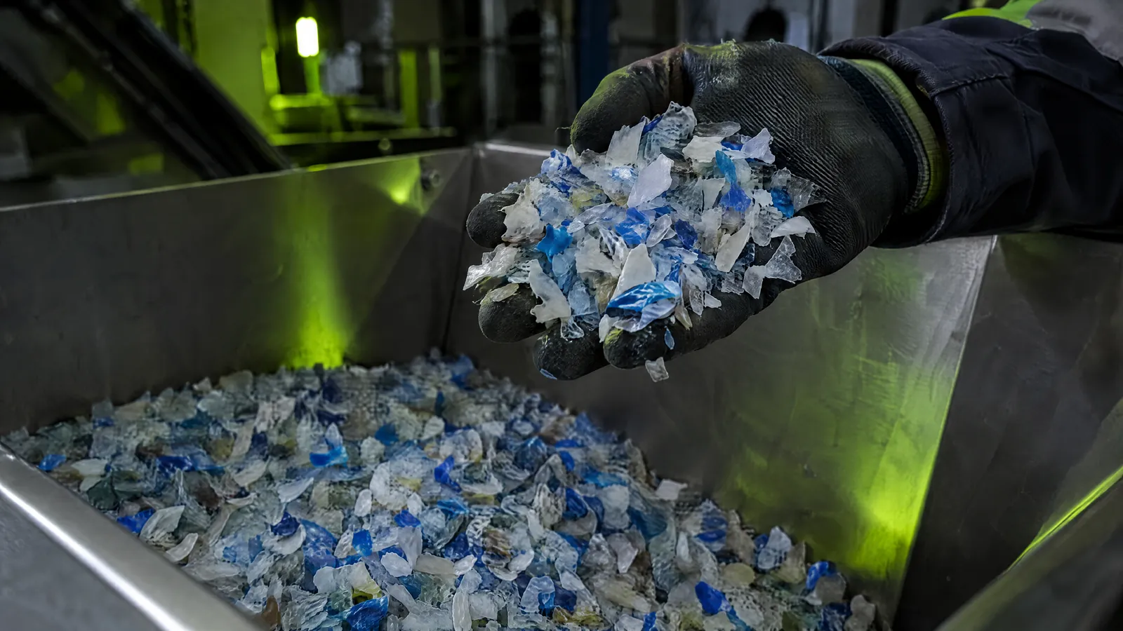 Recycled plastic flakes sorted by color and type